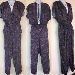 FREE PEOPLE Deep V-Neck Romper